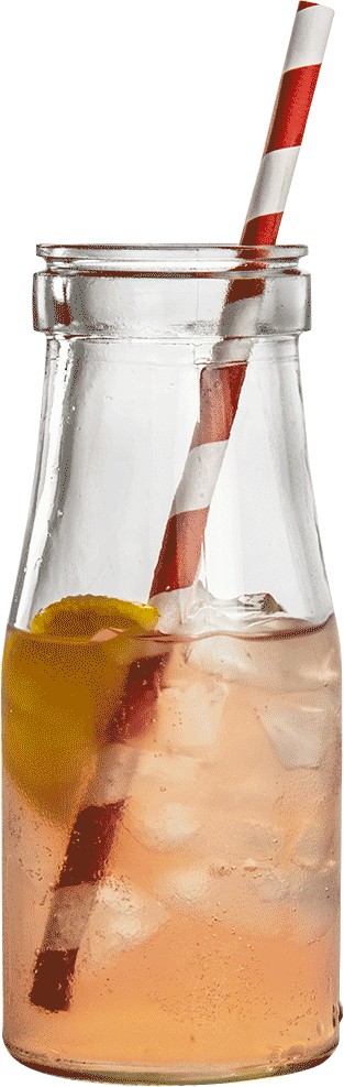 Garrafa de leite vintage 35 cl ao lado de um copo