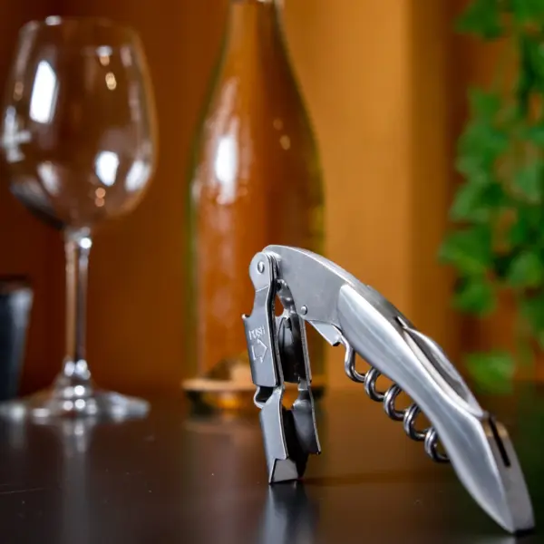waiter's friend corkscrew by The Bars in mirror-polished stainless steel, with worm, lever and bottle opener