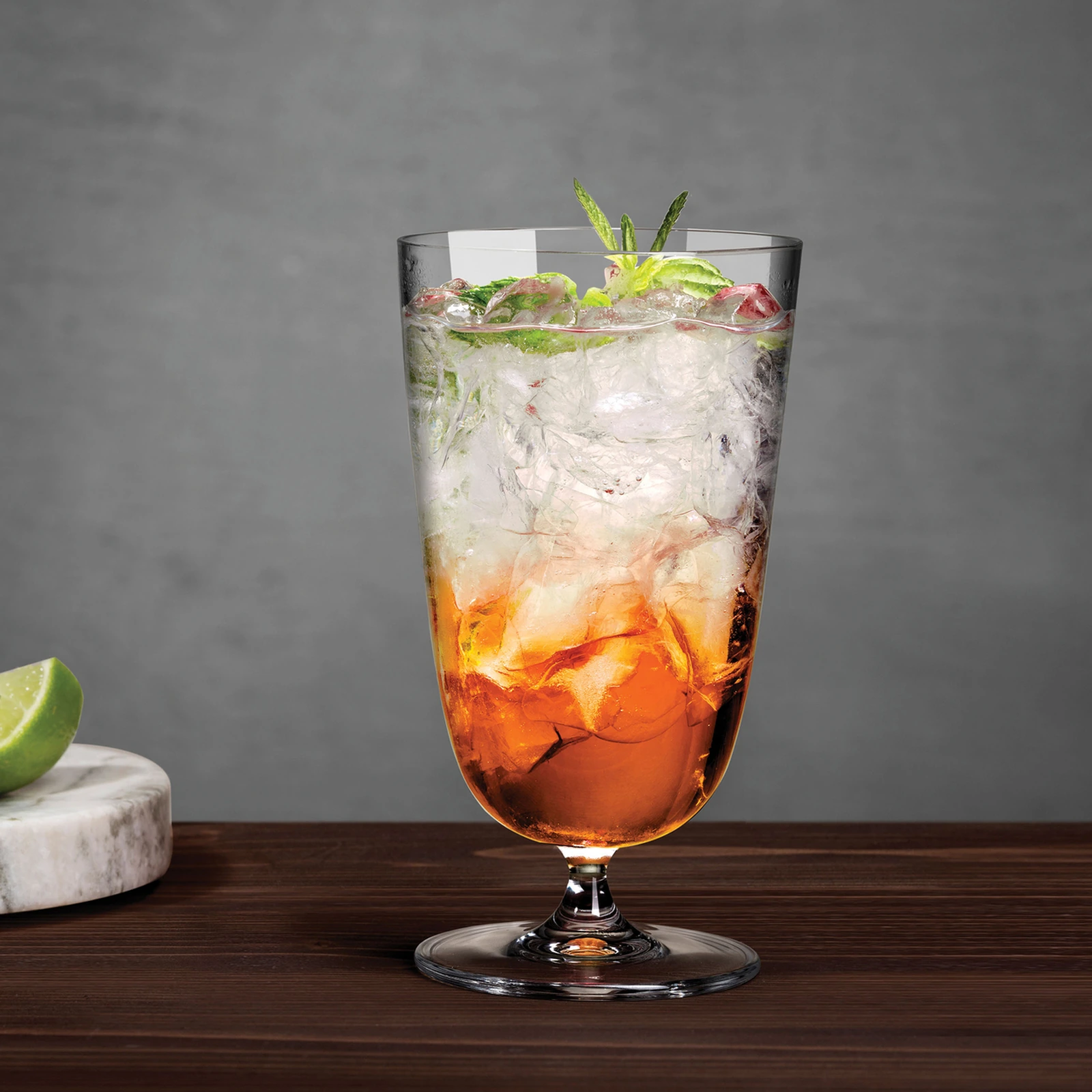 Highball glasses: Bargiani tall glass by NUDE, 370ml, on a short foot, served with a long drink and ice