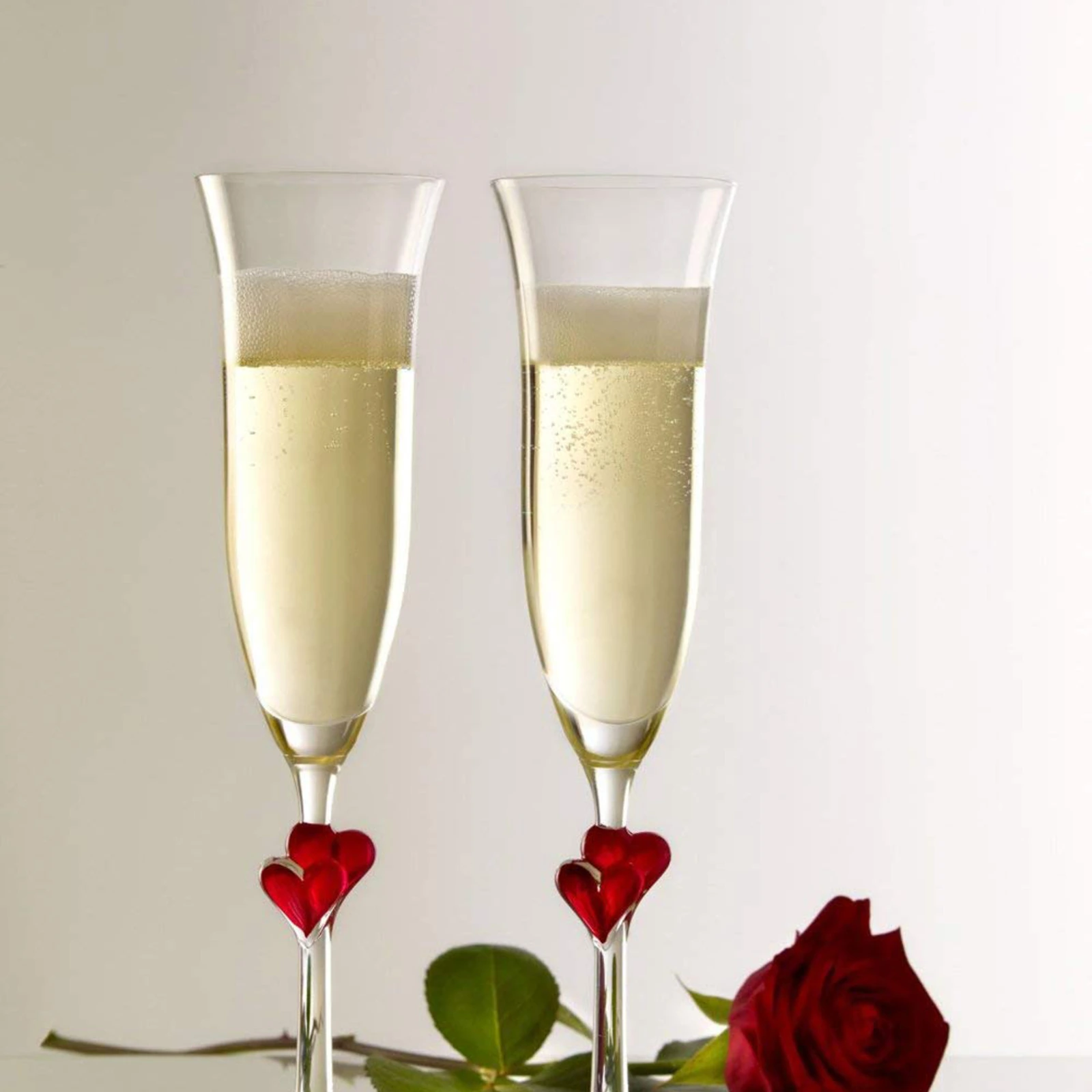 L'Amour 175ml champagne flute by Stölzle Lausitz in lead-free crystal, 24.2cm tall, red heart under the bowl